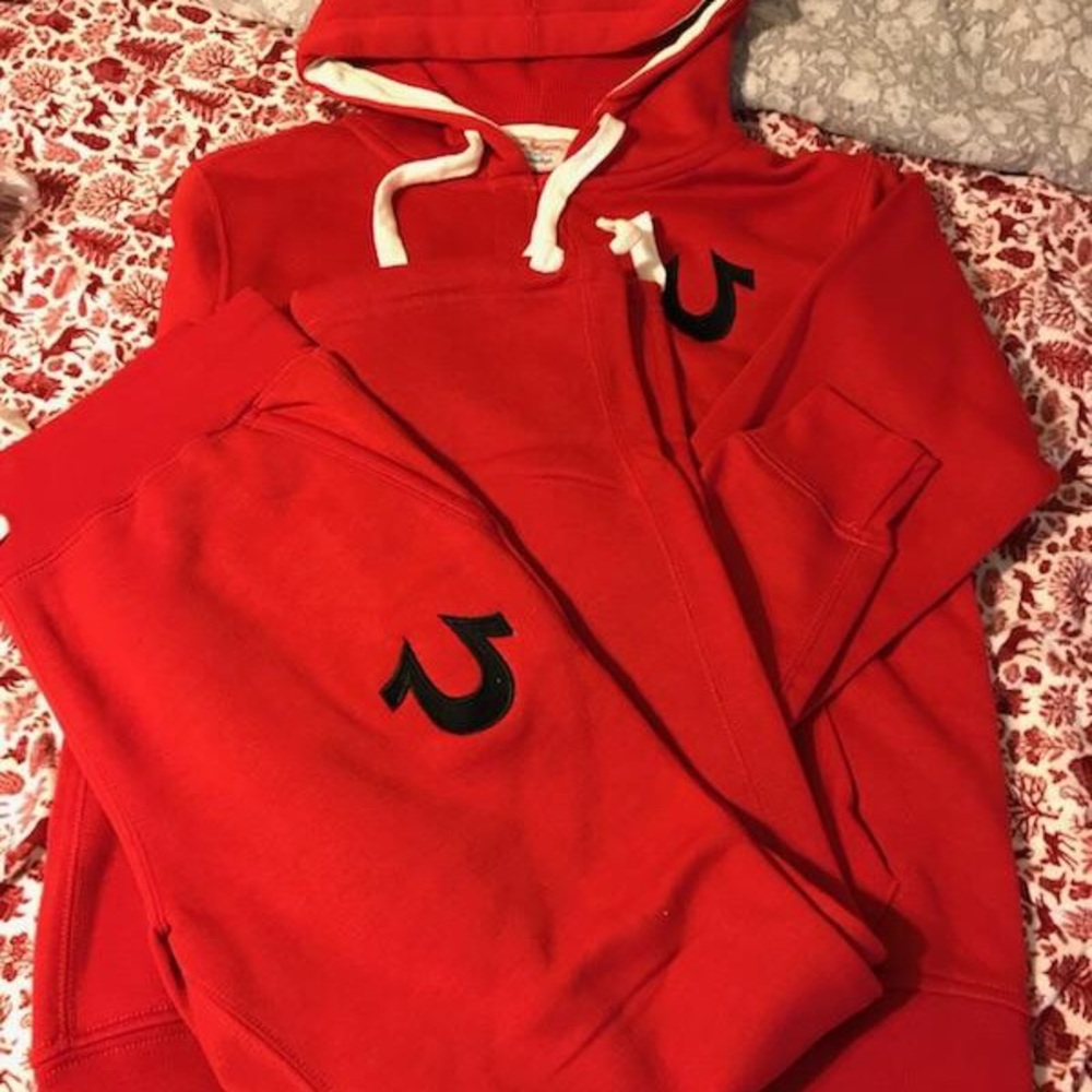 Red suit black logo